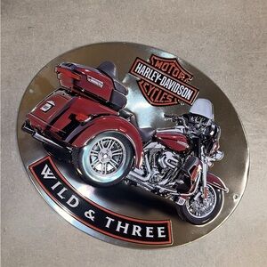 Harley-Davidson Silver and Red Motorcycle Sign
